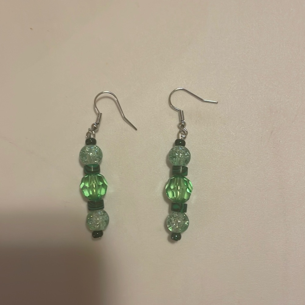 Green handmade beaded dangle earrings